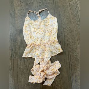 Pants Store- tank top with 2 bows to tie in back, open back, size L